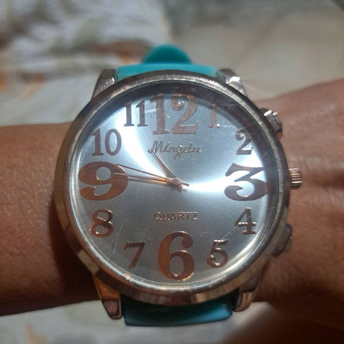 Women's watch used, rose gold with turquoise rubber strap