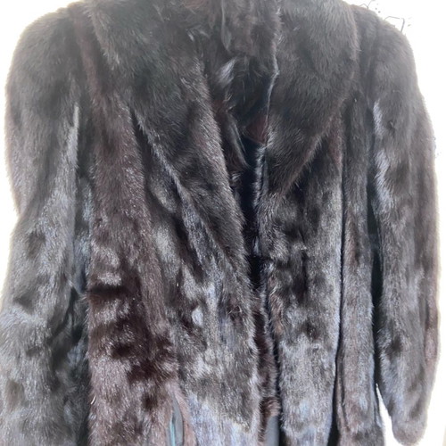 Fur genuine one-piece new, black, with pockets
