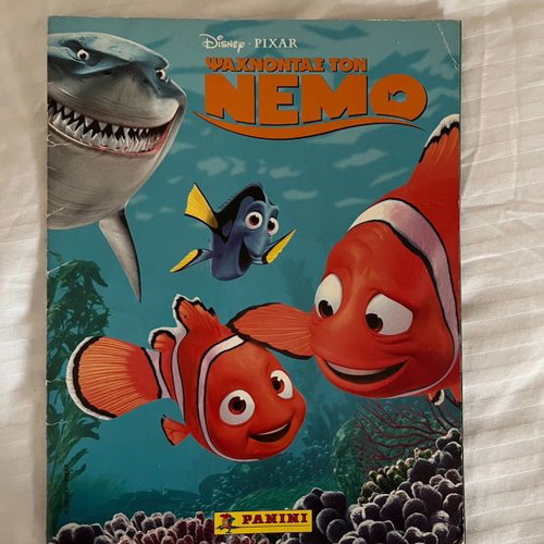 Panini Finding Nemo album used with 130 stickers attached