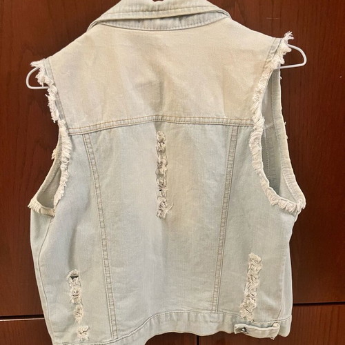 Sleeveless denim jacket used, size medium, blue