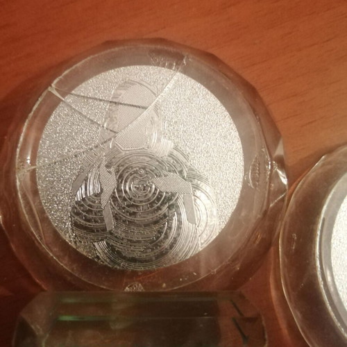 Small religious desk icons: Virgin Mary, Jesus, Crucifixion