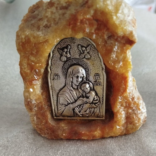 Image from natural mineral rock like new with the image of Virgin Mary