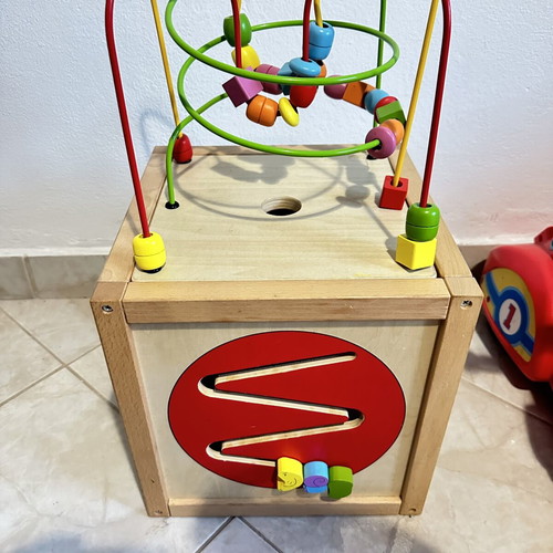 Wooden educational activity cube for children