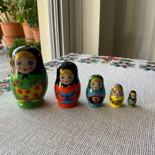 Matryoshka doll collectible like new, set of 5 with unique costumes