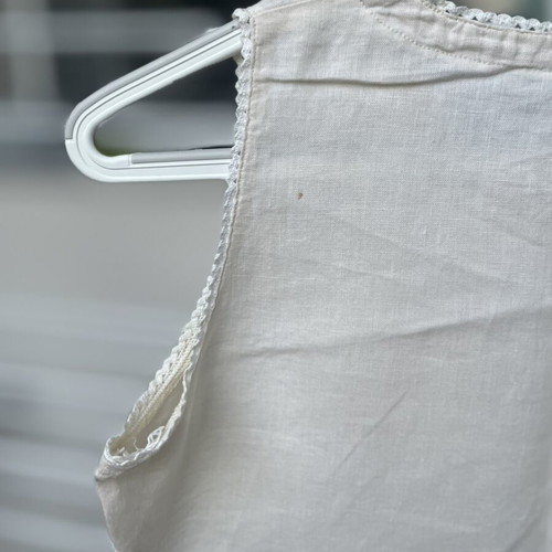 Cream linen blouse with cord and decorative edges