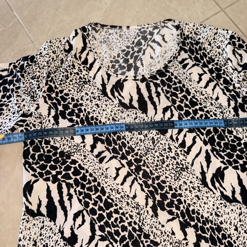Black and white patterned blouse, size M