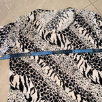 Black and white patterned blouse, size M