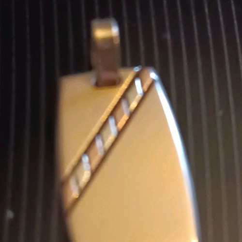 Gold pendant new with three gold colors, 5 grams