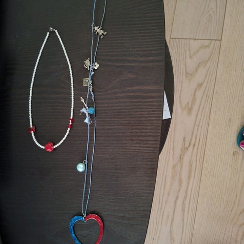 Necklaces pack of 2, like new, colorful, daisy and heart design