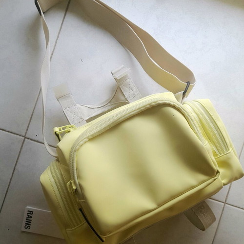 Rains shoulder bag, beige and yellow, waterproof fabric