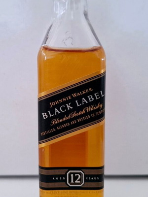 Johnny Walker Black Label collectible miniature sealed plastic bottle