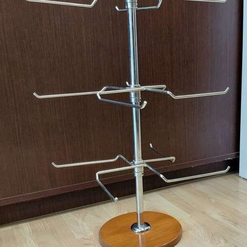 Metal three-tier countertop stand used with wooden base