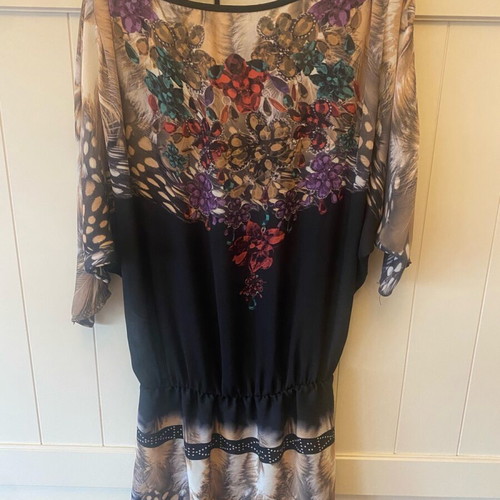 Relish long top new with elastic hem and deep back