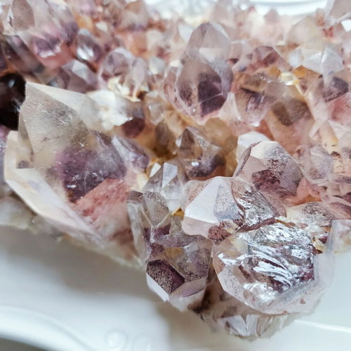 Mineral quartz with oxide inclusions like new