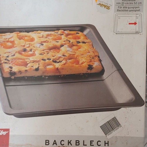 Expandable baking tray like new, 33 to 52 cm