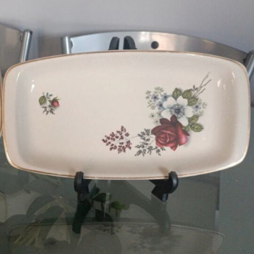 Set of painted plates with roses like new, gold-trimmed edges