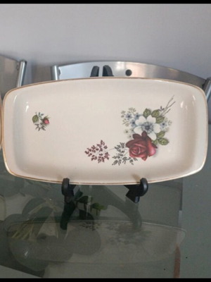 Set of painted plates with roses like new, gold-trimmed edges