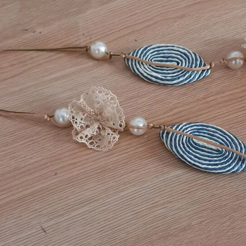 Women's necklace used handmade with pearls and cord