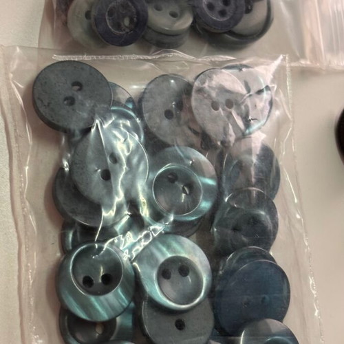 Various green and metal buttons like new