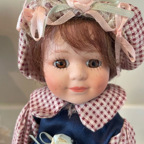 BC porcelain dolls like new, set of 2 pieces