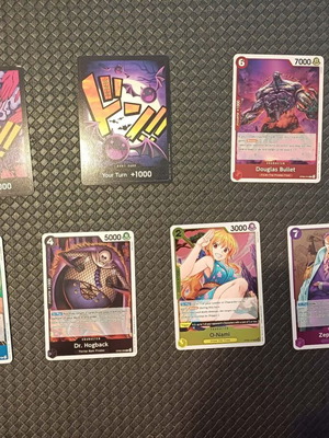 One Piece trading cards set of 7 like new, 4 holo 2 don