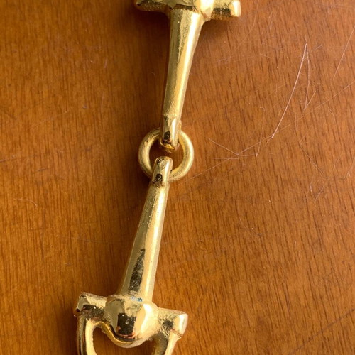 Metal decorative snaffle bits 22 pieces like new, gold color