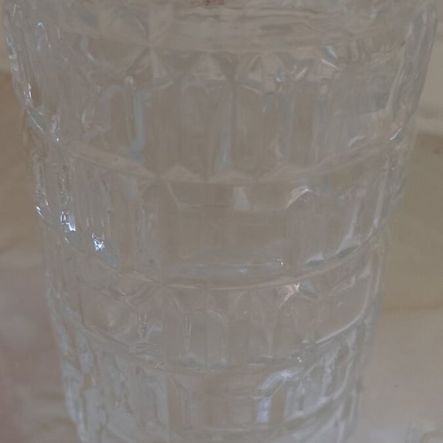 Glass decanter with stopper used, beveled design