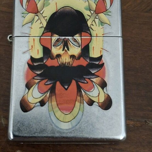 Zippo lighter with skull tattoo design 2004