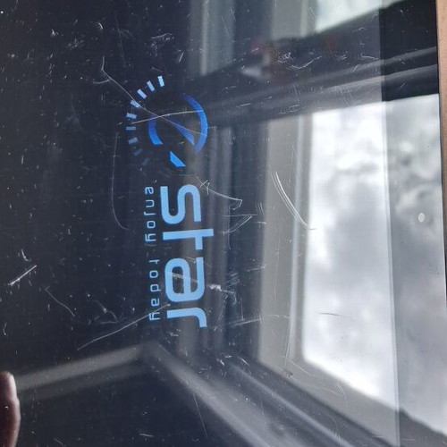 E Star tablet used, for parts or use, with charging cable