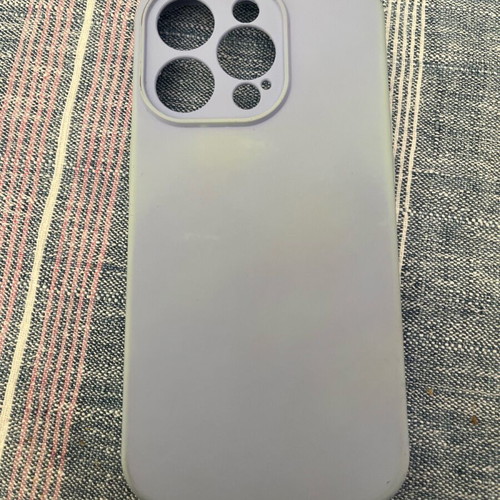 iPhone 14 Pro genuine case used with minor wear and blue case included
