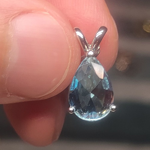 Women's necklace with blue gemstone