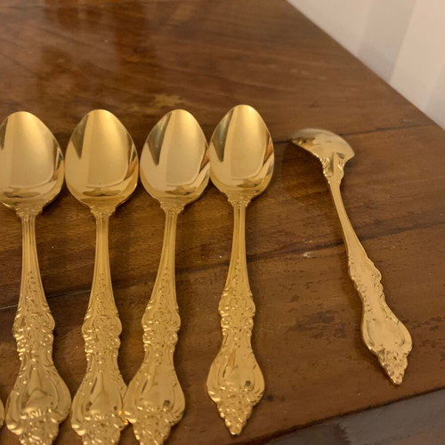Gold-plated spoons set like new