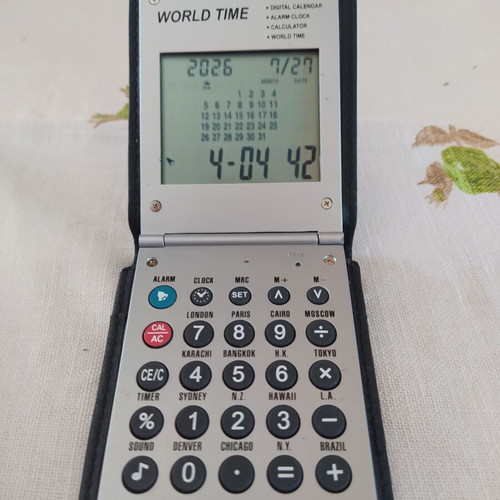 Number machine with world time, calendar, alarm clock, new