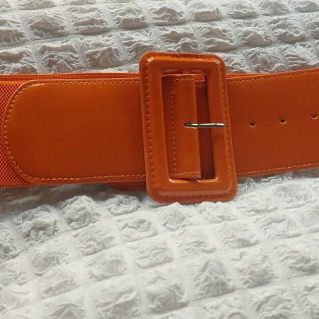 Wide elastic orange belt like new adjustable
