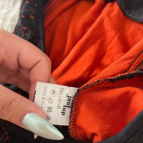 JusTop turtleneck bodysuit black and orange, like new, missing one button