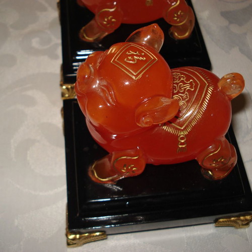 Vintage Feng Shui amber honey Murano-style pig figurines pair
