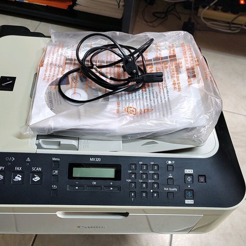 Canon MX320 all-in-one used with fax, scanner and color printer