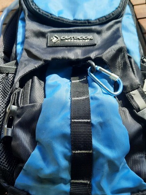 Outdoor Products water backpack like new, 2 liters, black and blue