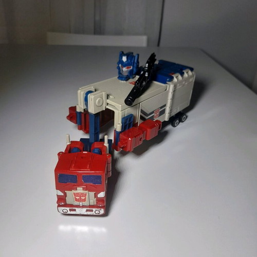 Optimus Prime used toy with missing parts