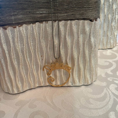 Dream necklace used with gray chain and gold pendant