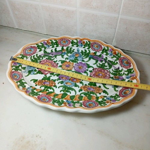 Oval platter Skyrian folk art like new with hand-painted flowers