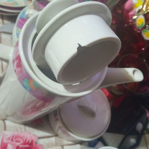 China tea set with 6 cups and saucers, creamer, sugar bowl, and teapot