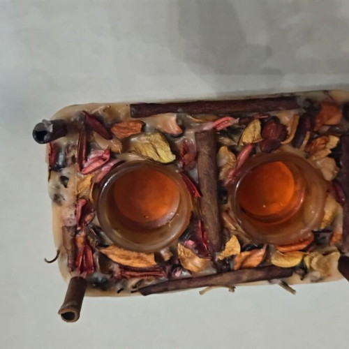 Handmade rectangular candle with aromatic potpourri like new