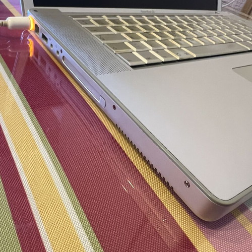 Apple PowerBook G4 15-inch laptop with original charger