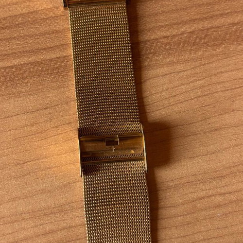 Oozoo gold watch like new, few missing rhinestones