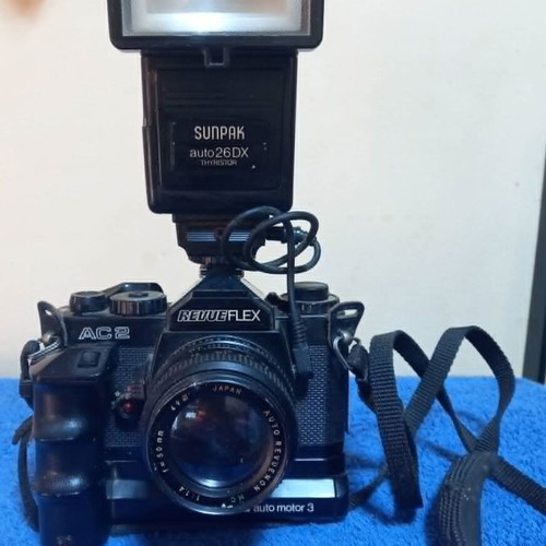 Revueflex AC2 35mm SLR film camera used with Sunpak Auto 26 DX flash