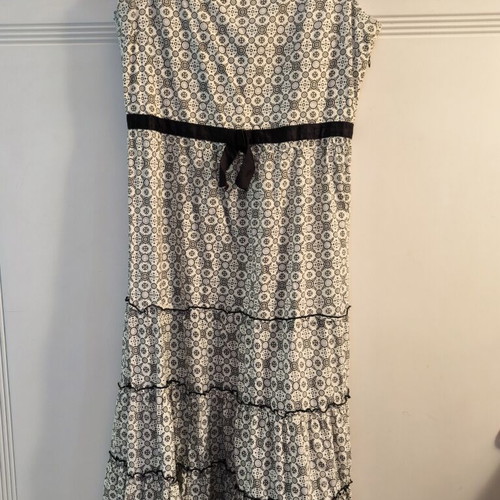 Cotton dress with ruffles, black trims, zipper waist