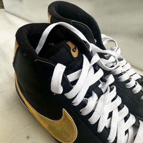 Nike boots black with gold details like new No 42 unisex