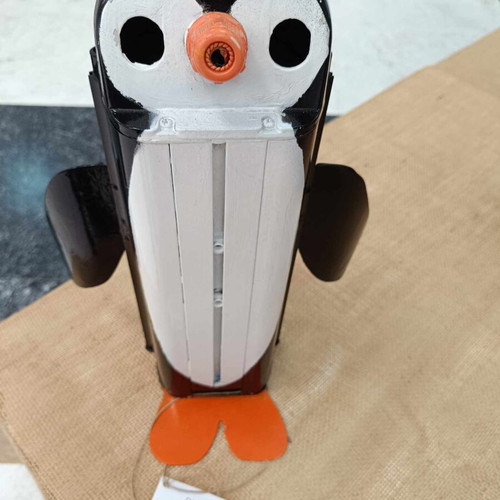 Decorative penguin like new made from recycled CCTV camera