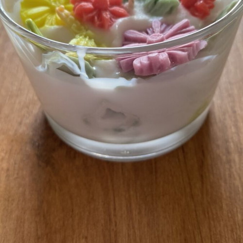 Soy wax scented candle in jar with vanilla aroma